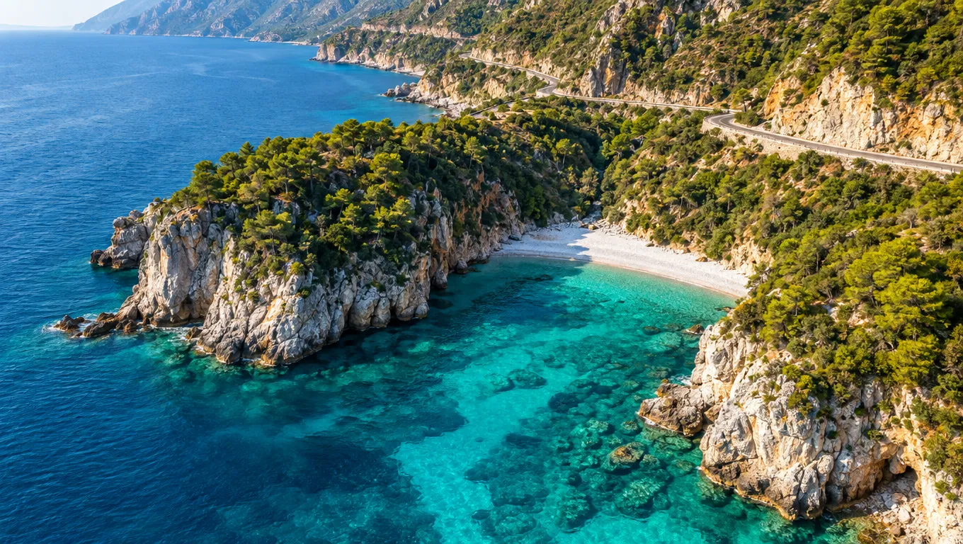 Turquoise water and white pebble beach on the Albanian Riviera